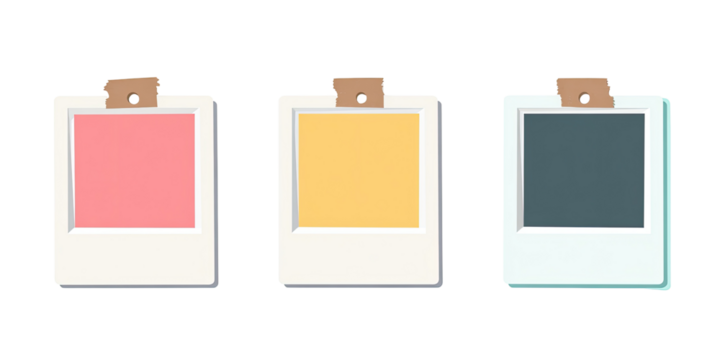 Three empty instant photo frames in pastel colors