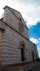 facade  of santa chiara basilica in assisi in umbria