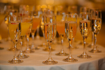 Celebration gathering with sparkling drinks on a table during a festive evening