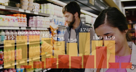 Browsing couple inspecting drinks on refrigerated aisle with package, bar-chart overlay, copy space