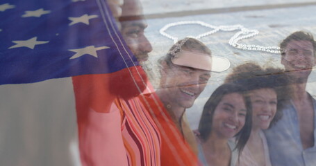 Smiling friends wearing summer clothing on wooden boardwalk, with US flag overlay and dog tags