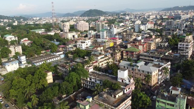 Aerial View of Cityscape with Hills and Urban Buildings, Assam, India