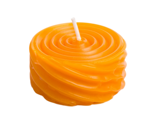 A unique orange spiral-shaped candle, an artistic and decorative item, isolated on white.