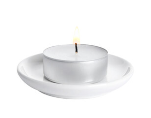 A small, lit tea light candle in a metal cup, perfect for warm ambiance, isolated on white.