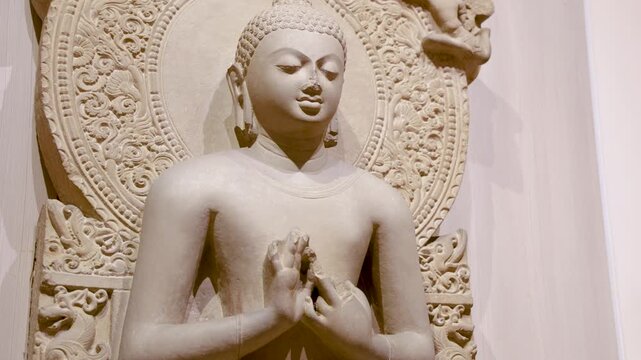 ancient ruined idol of lord buddha in meditation from different angle