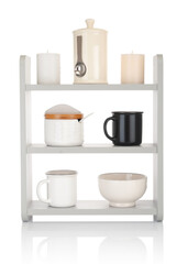 Wooden shelf with different kitchen utensil on a white background