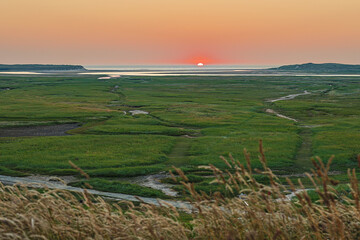 Texel, De Slufter, the sun has half set, sunset, Holidays, North Sea, island, nature reserve,...