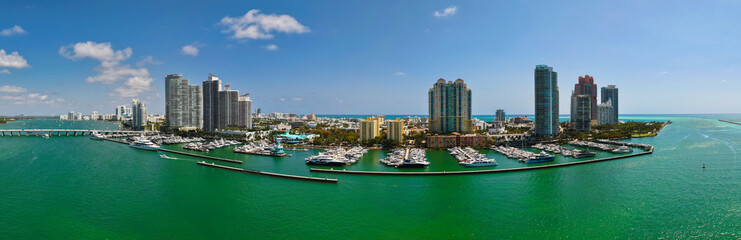 Panoramic Miami marina with luxury yacht. Summer vacation. Luxury marina. Cityscape panorama....