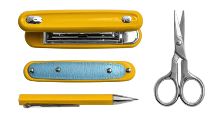 Stationery tools including stapler, scissors, and a pen on isolated background.