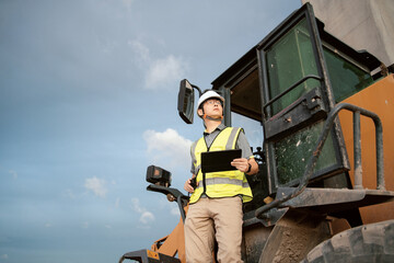 asian male engineer working in construction site for bridge