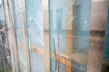 Building with dirty glass in broken window.
