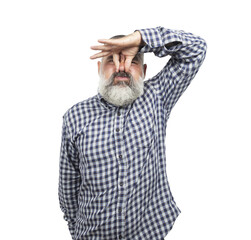 Bearded man pinching his nose to avoid a bad smell, expressing disgust and displeasure
