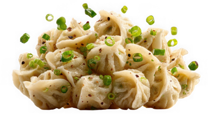 Delicious pile of steamed dumplings garnished with fresh green onions isolated on transparent background