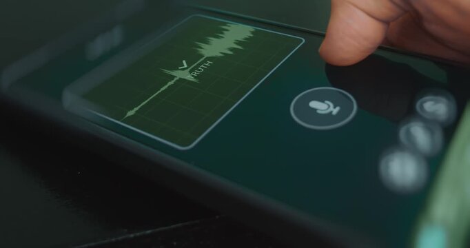 Lie detector app on smartphone recording the voice, result is Truth