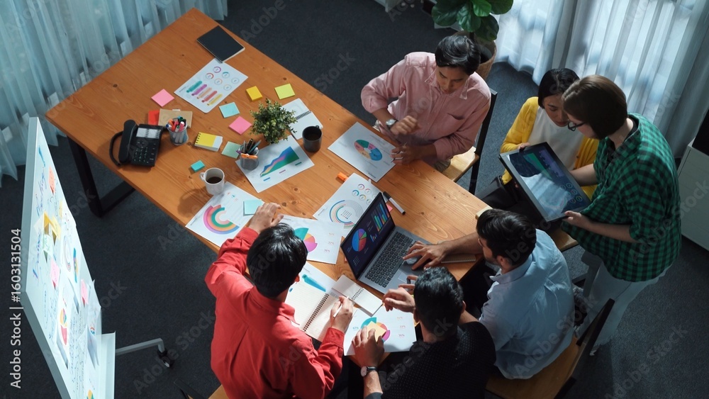 Poster top view of skilled business team discussing and talking about financial statistic to make decision 