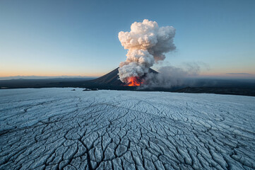 Volcano erupts ash and lava over icy landscape