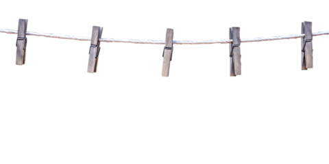 Wooden clothespins on white rope isolated on a transparent background hanging laundry