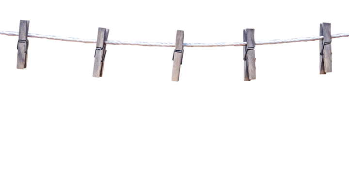 Wooden clothespins on white rope isolated on a transparent background hanging laundry