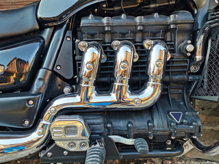 Detail of chrome motorcycle engine.
