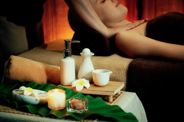 Aromatherapy massage ambiance or spa salon composition setup with focus decor candles and spa...