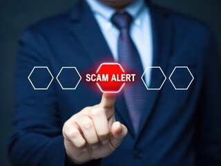 Businessman points to a digital screen displaying a scam alert warning