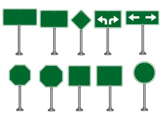 A collection of green road signs in various shapes and sizes on metal poles against a white background