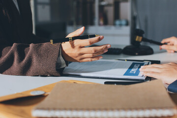 Lawyer explained to the client about the law that must be brought against the court case.