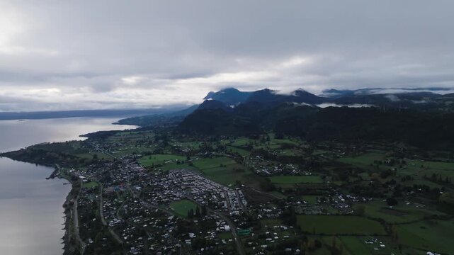Aerial View of Ranco Lake with Forest Mountains and Blue Sky Southern Chile 