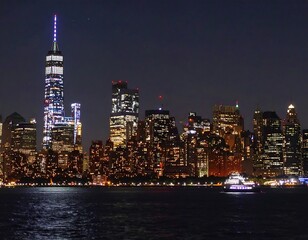 Obraz premium Illuminated New York City skyline at night