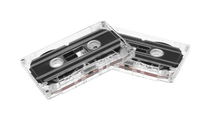 Audio cassettes with magnetic tapes isolated on white