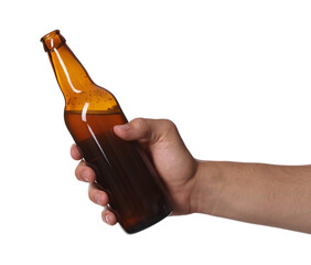 Man with bottle of tasty beer on white background, closeup
