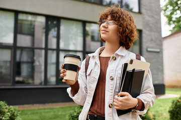 Casual young woman enjoys coffee while standing outside modern office building