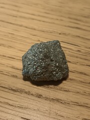 Pyrite Specimen on Wooden Surface - Fool's Gold Mineral