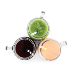 Superfood. Different tasty smoothies in mason jars isolated on white, top view