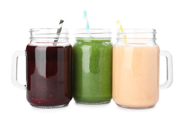 Superfood. Different tasty smoothies in mason jars isolated on white