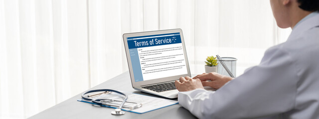 Online term of service conditions showing brisk rules and regulations in using the website on device screen for users to make an agreement to the online term of service
