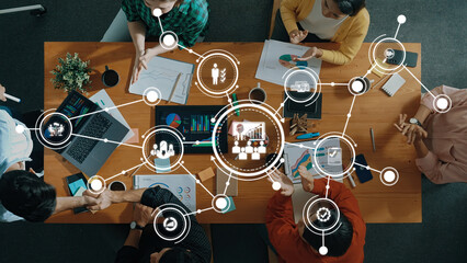 Collaborative Team Meeting with Data Visualization and Digital Tools for Effective Management and...