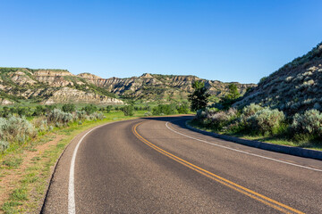 Beautiful views of the canyon on both sides of the highway in the Theodore Roosevelt National Park in North Dakota