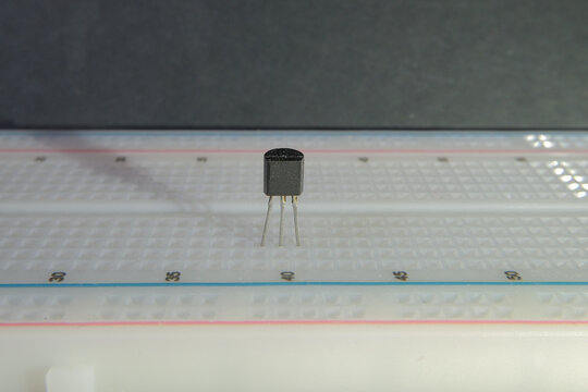 Transistor on the breadboard. Single semiconductor component. 