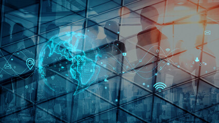 A modern business environment showcasing silhouettes of professionals with digital global network...