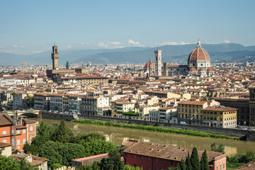 Naklejka premium A Florence Firenze city in Italy Toscana view with a river running through it