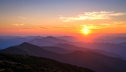 Fototapeta premium Panoramic sunset over mountain ranges