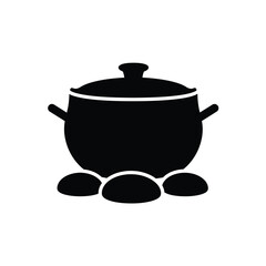 Black pot resting on three rocks icon cooking food