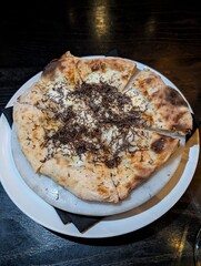 Bianco Pizza topped with Black Truffles