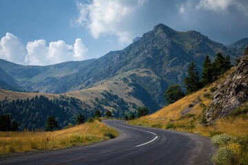 Fototapeta premium Mountain road on a summer day