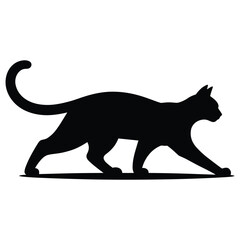 Black cat walking in silhouette with tail raised