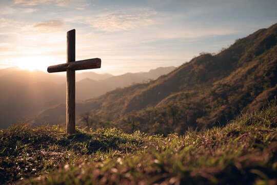 Sunrise outdoor photo of a cross on a hill symbolizes Jesus resurrection
