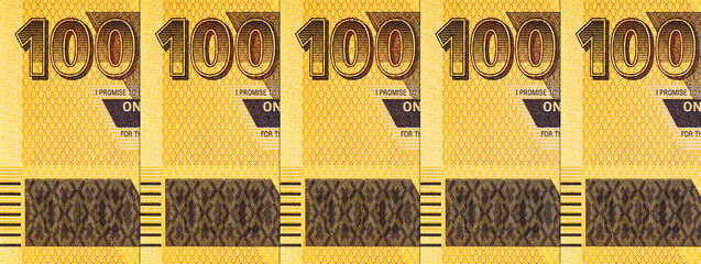 Zimbabwe 100 dollar banknote, fragment for designers. Zimbabwe paper money.