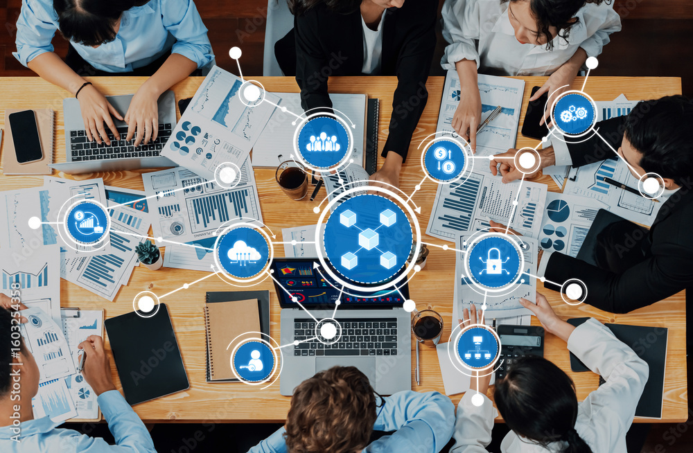 Poster a dynamic business meeting scene showing a diverse team analyzing data with digital graphics represe
