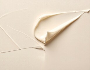 Creamy Beige Cosmetic Texture Swirls on a Smooth Neutral Background